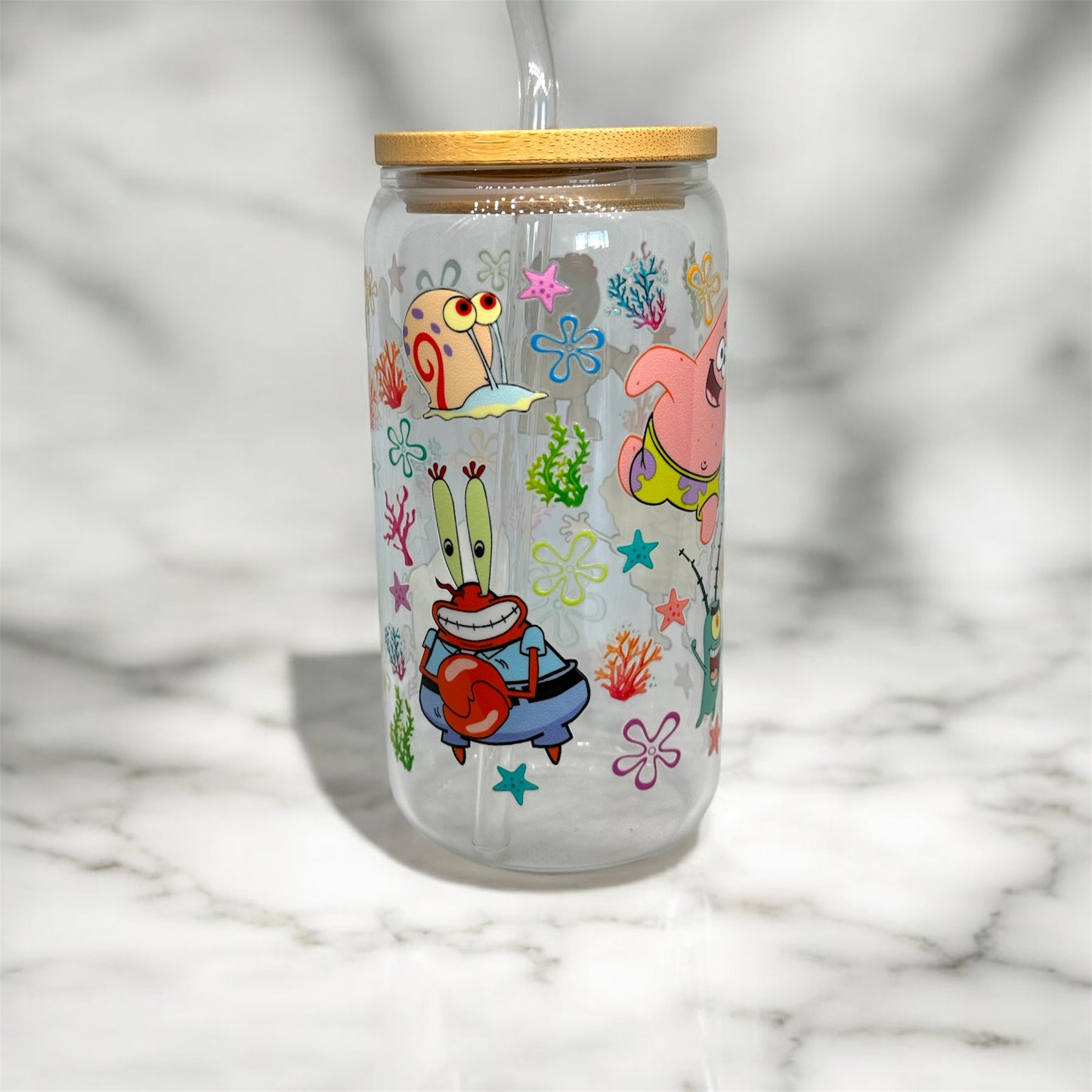 Glass cup with straw