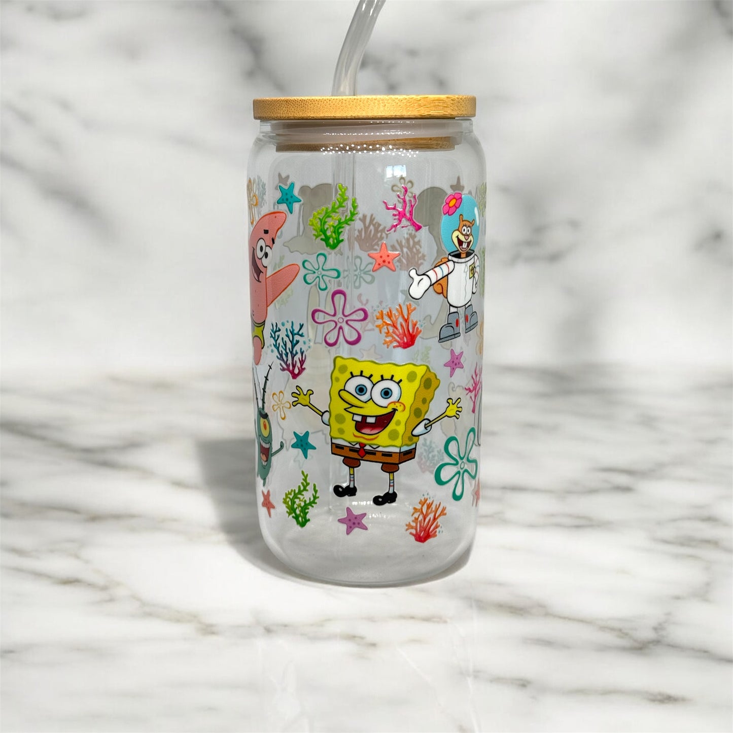 Glass cup with straw