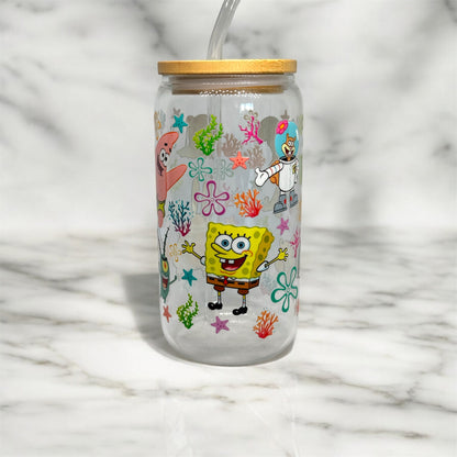 Glass cup with straw