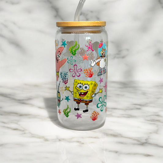 Glass cup with straw