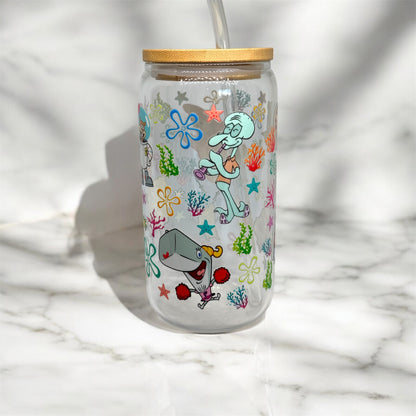 Glass cup with straw