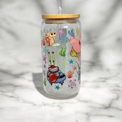 Glass cup with straw